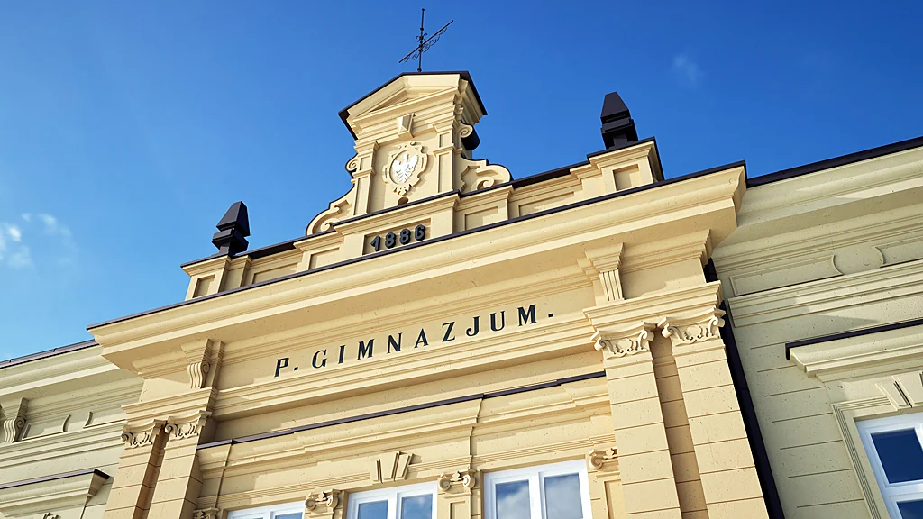 SLIDER 02-04 Zwieńczenie ryzalitu z zegarem i napisem „GIMNAZJUM” – I LO w Bochni
